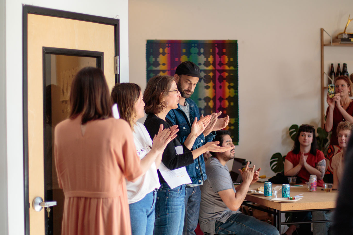 Images of people participating in a design tournament.