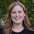A headshot of Lauren Booth, Executive Director of Oregon Well-Being Trust.
