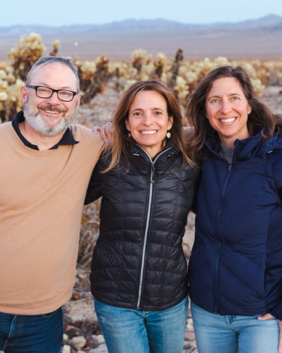 Closeup of the three S&C partners in Joshua Tree on a team retreat