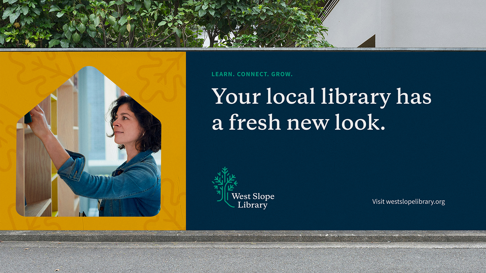 Billboard mockup with the new West Slope Library branding.